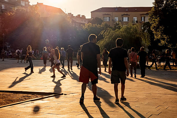 Evening stroll at golden hour in an urban park